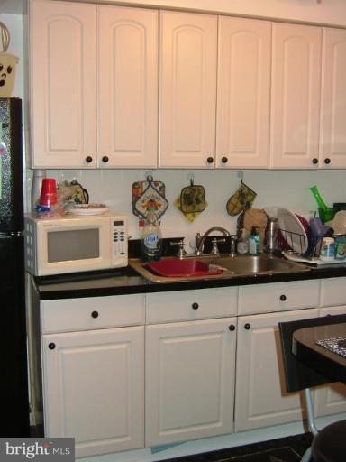 1628 Pentwood Road Baltimore, MD 21239 - Photo 6 of 9 Beautiful new white kitchen.