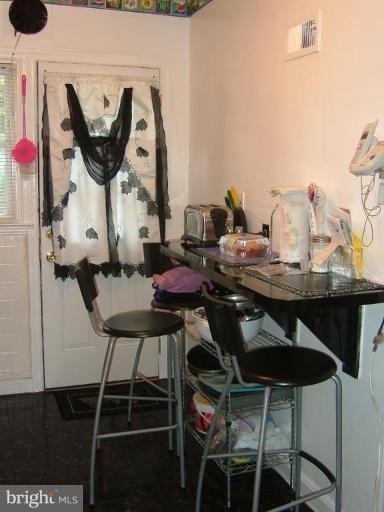 1628 Pentwood Road Baltimore, MD 21239 - Photo 7 of 9 Kitchen breakfast bar!