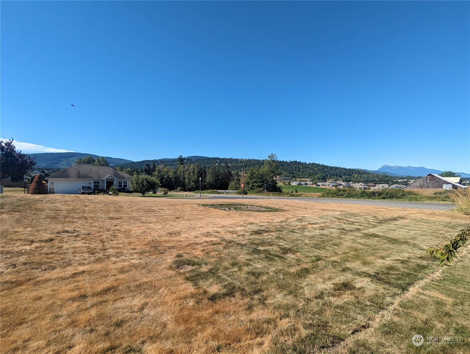 999 Morgison Loop Sequim, WA 98382 - Photo 15 of 15 a view of lake and mountain