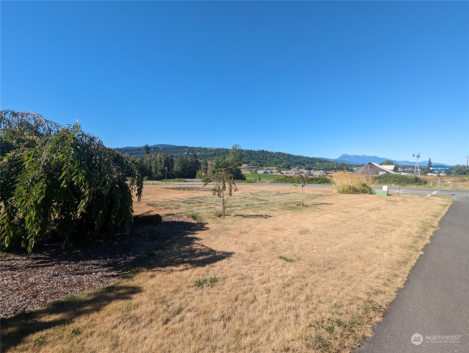 999 Morgison Loop Sequim, WA 98382 - Photo 5 of 15 a view of lake view with mountain in background