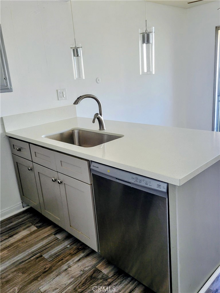 2255 Cahuilla Street, Unit 68 Colton, CA 92324 - Photo 29 of 30 a close view of a sink a faucet and appliances in the kitchen