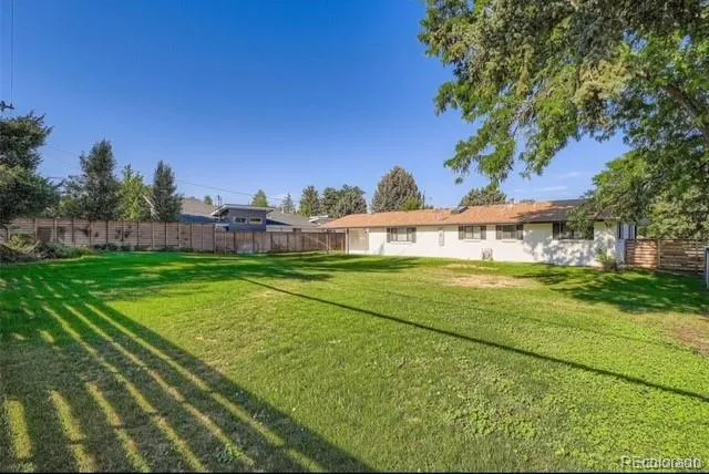 a view of a house with a big yard