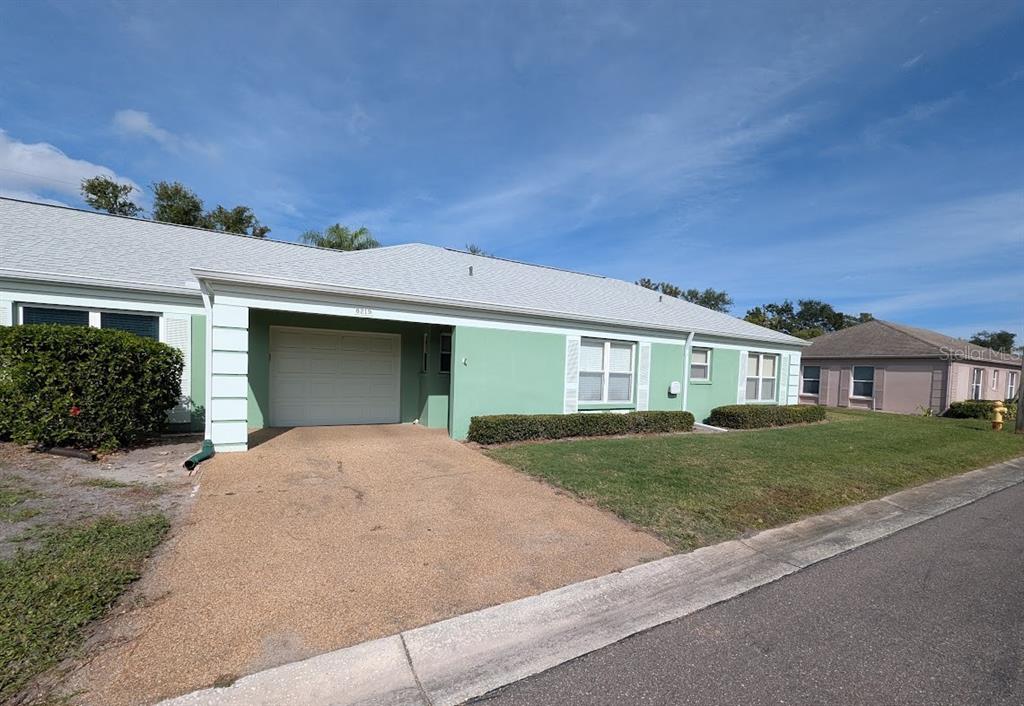 front view of a house and a yard