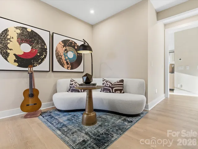 a bedroom with furniture and windows