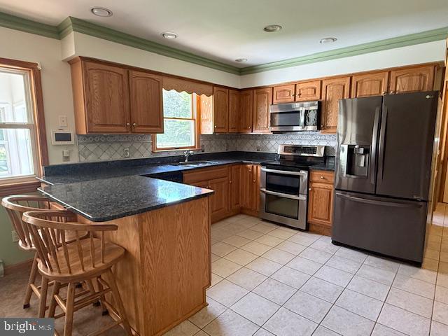 22360 Great Oak Landing Road Chestertown, MD 21620 - Photo 23 of 65 Modern kitchen with warm wood accents.