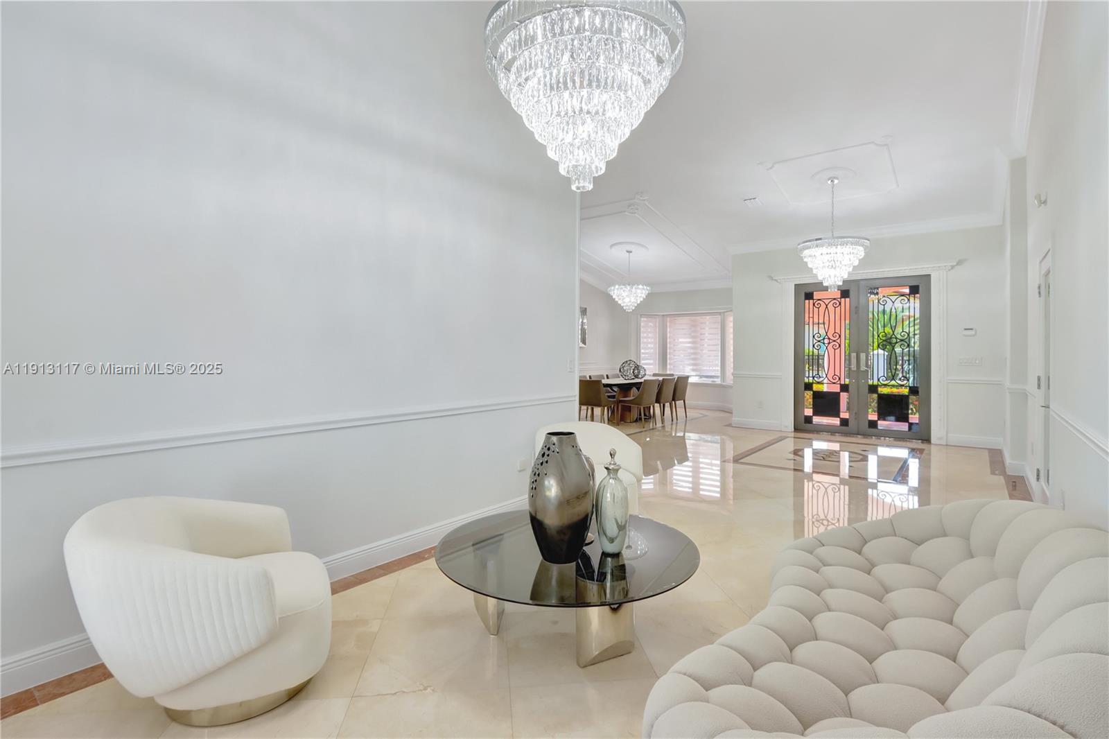 3191 Southwest 133rd Court Miami, FL 33175 - Photo 8 of 33 a living room with furniture and a chandelier