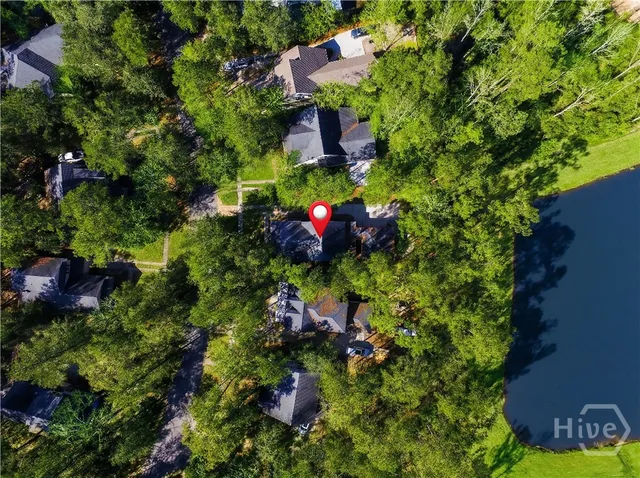 $495,000 | 145 Blackjack Oak Drive East, Richmond Hill, GA 31324