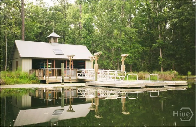 $495,000 | 145 Blackjack Oak Drive East, Richmond Hill, GA 31324