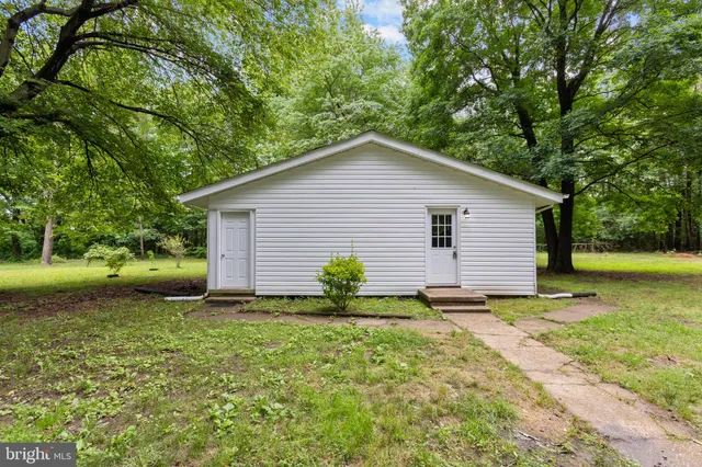 a view of a backyard with a garden