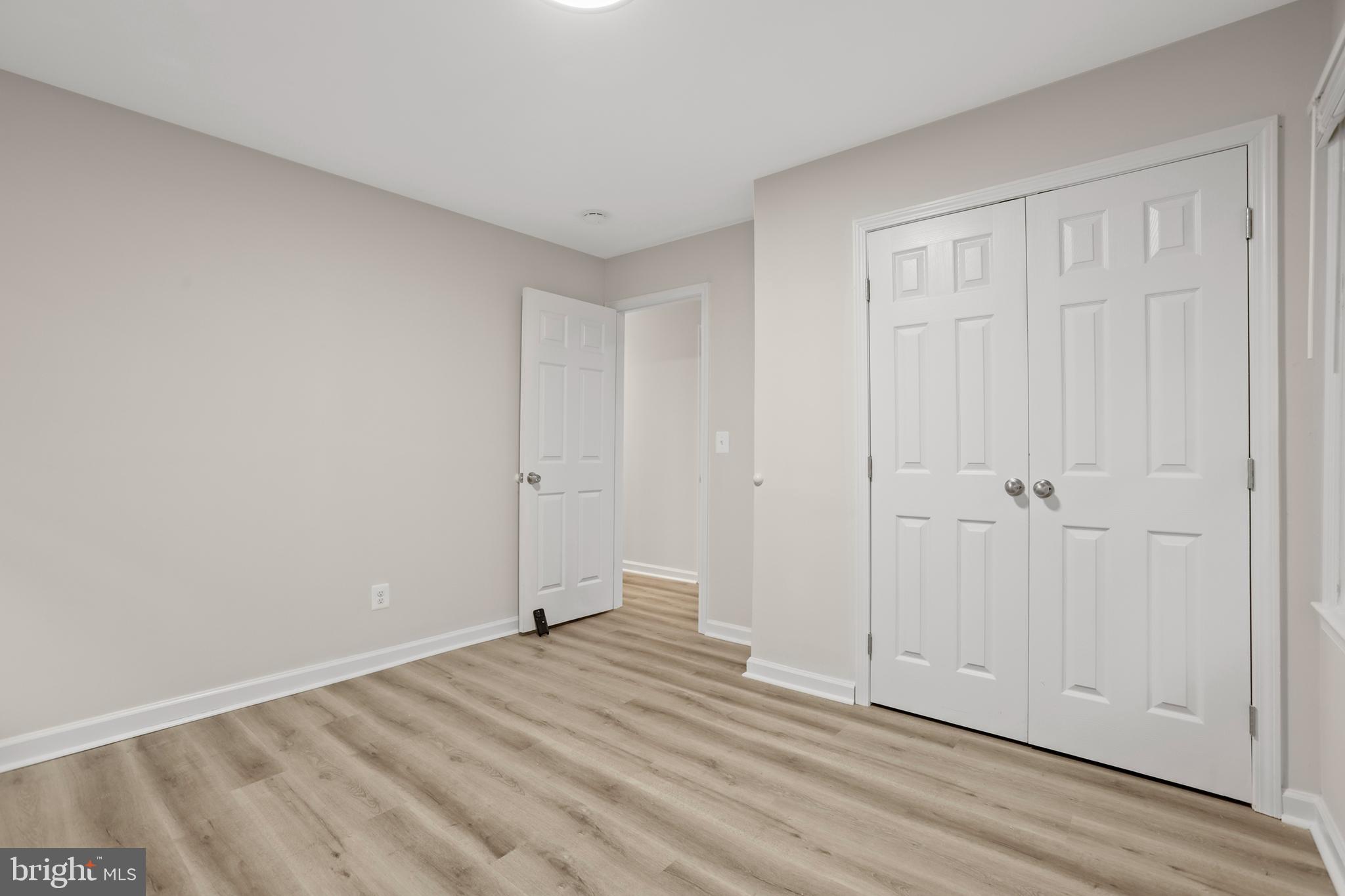 1003 Cedar Hill Road Colonial Beach, VA 22443 - Photo 19 of 25 a view of empty room with wooden floor