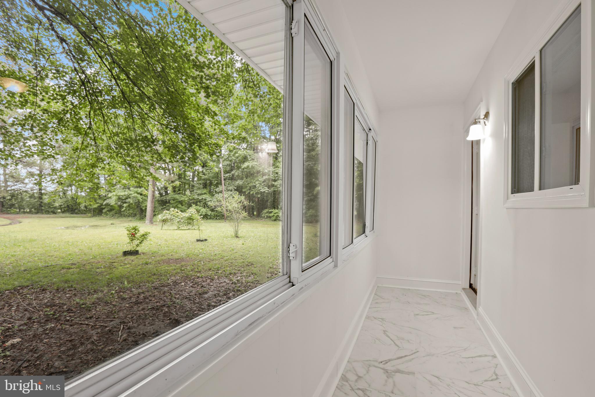 1003 Cedar Hill Road Colonial Beach, VA 22443 - Photo 5 of 25 a view of a backyard