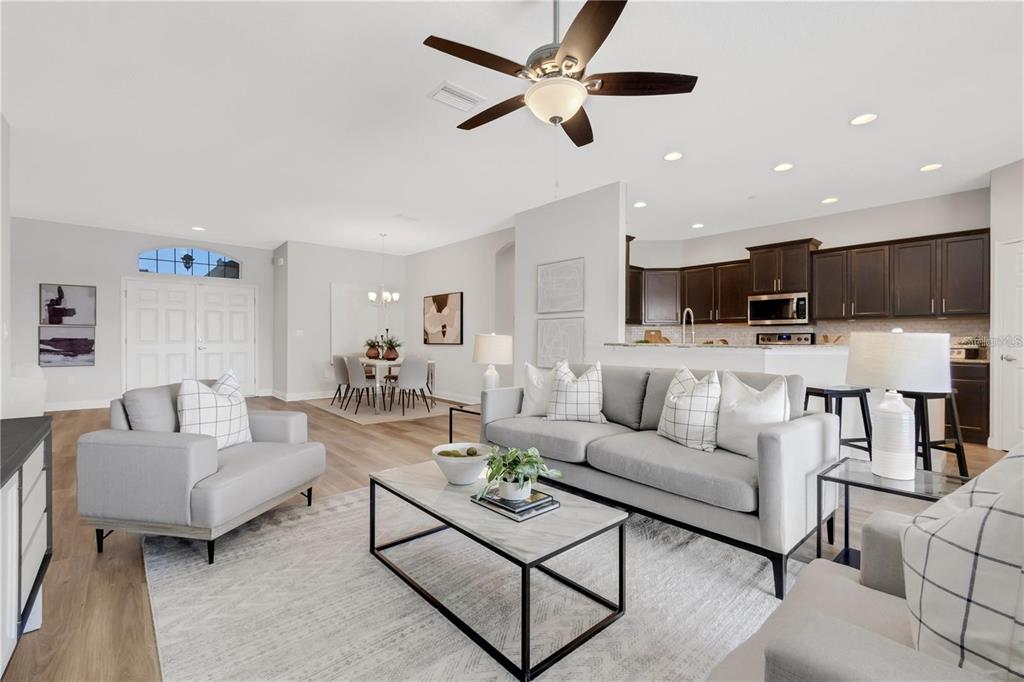 1918 Berry Road Plant City, FL 33567 - Photo 16 of 53 a living room with furniture and a view of kitchen