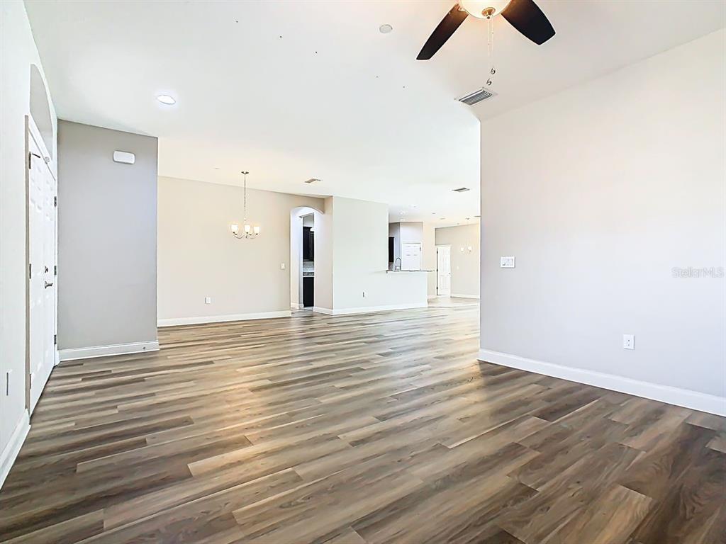1918 Berry Road Plant City, FL 33567 - Photo 20 of 53 a view of a room with wooden floor