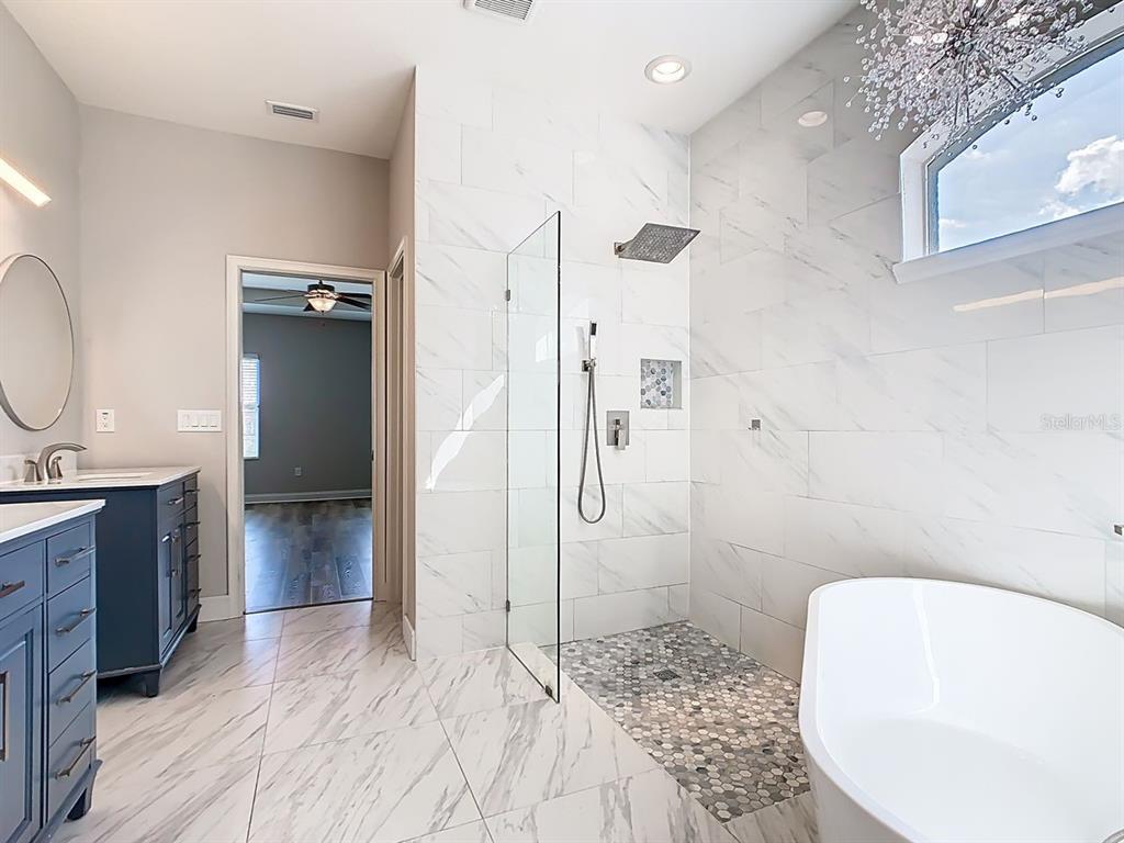 1918 Berry Road Plant City, FL 33567 - Photo 26 of 53 a bathroom with a sink a toilet and shower