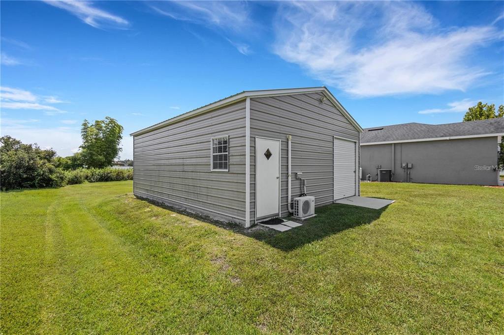 1918 Berry Road Plant City, FL 33567 - Photo 39 of 53 a view of a backyard of the house