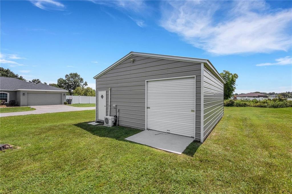 1918 Berry Road Plant City, FL 33567 - Photo 41 of 53 a backyard of a house with lots of green space