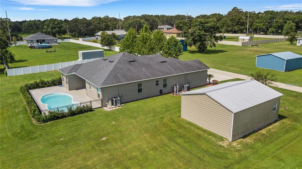 1918 Berry Road Plant City, FL 33567 - Photo 51 of 53 an aerial view of a house having yard and a big yard