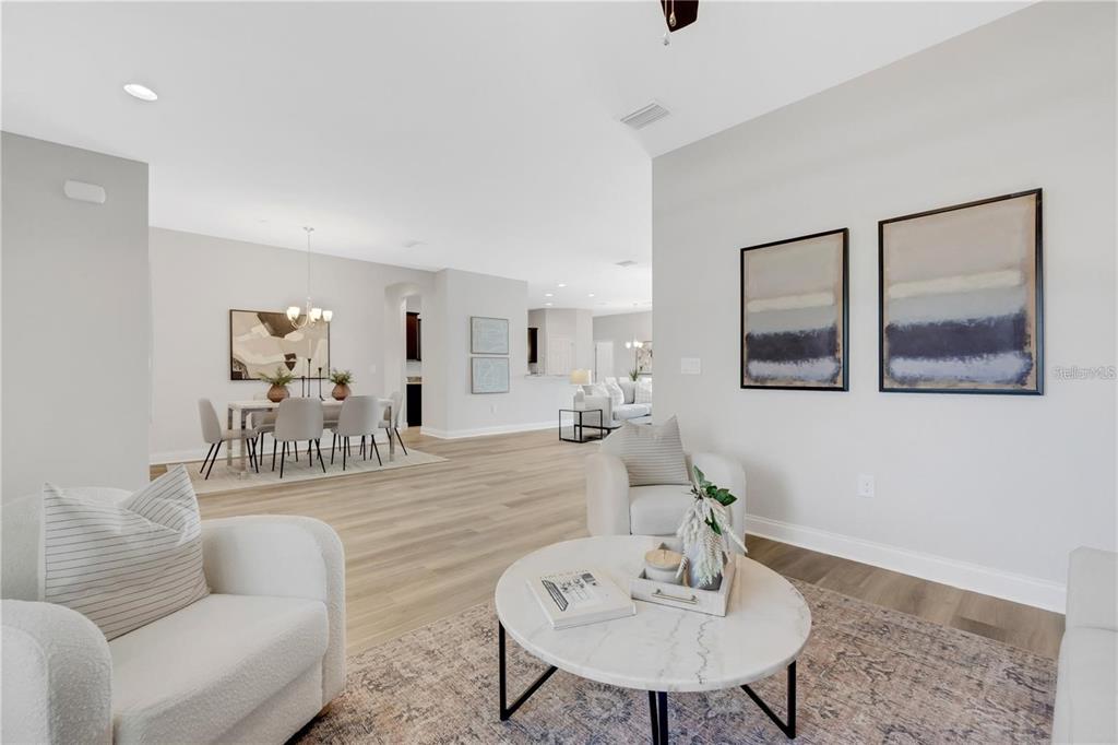 1918 Berry Road Plant City, FL 33567 - Photo 9 of 53 a living room with furniture and a mirror