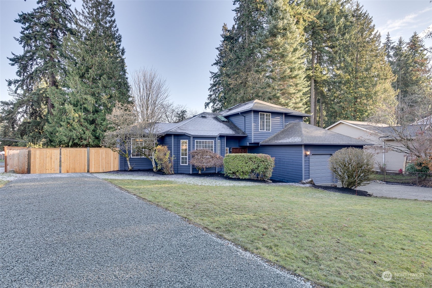 19805 3rd Drive Southeast Bothell, WA 98012 - Photo 1 of 1 a view of a house with a yard and large trees
