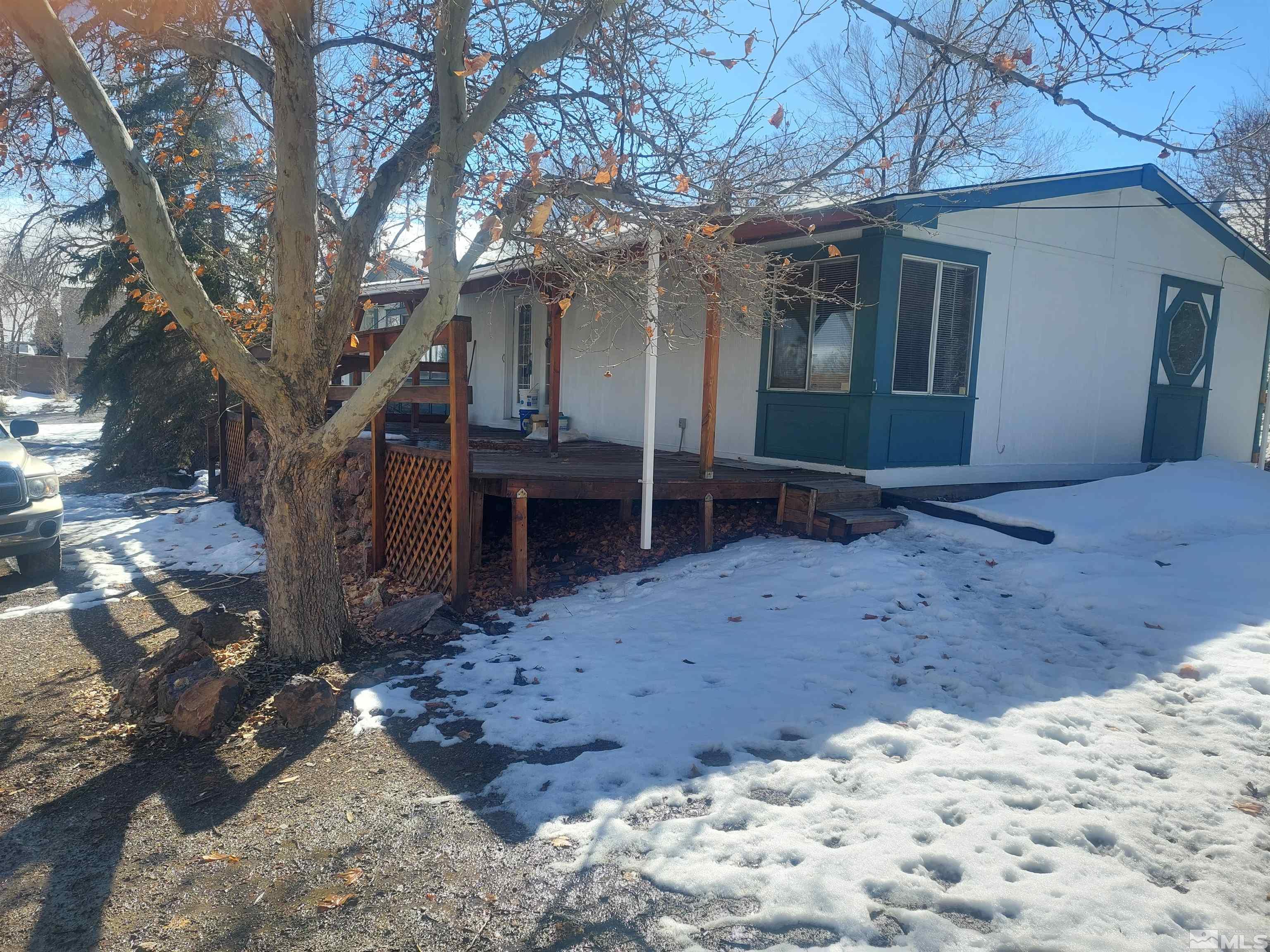 65 Walt Street Reno, NV 89506 - Photo 3 of 16 a view of a house with a yard