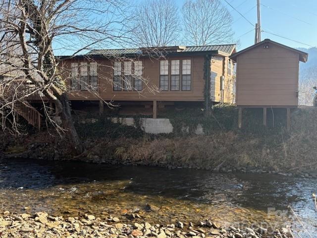129 Mallard Loop Waynesville, NC 28785 - Photo 13 of 40 a front view of a house with a yard