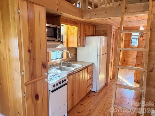 129 Mallard Loop Waynesville, NC 28785 - Photo 18 of 40 a kitchen with stainless steel appliances granite countertop a refrigerator and a sink