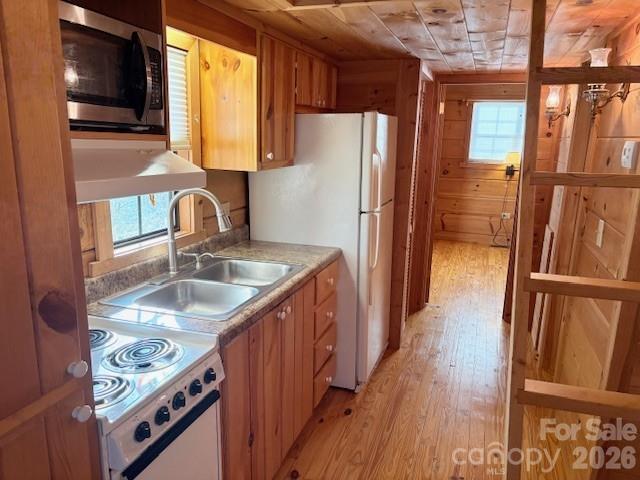 129 Mallard Loop Waynesville, NC 28785 - Photo 19 of 40 a kitchen with stainless steel appliances granite countertop a refrigerator and a sink