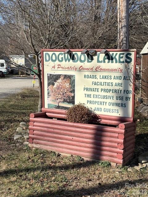 129 Mallard Loop Waynesville, NC 28785 - Photo 35 of 40 a view of a back yard of the house and car parked