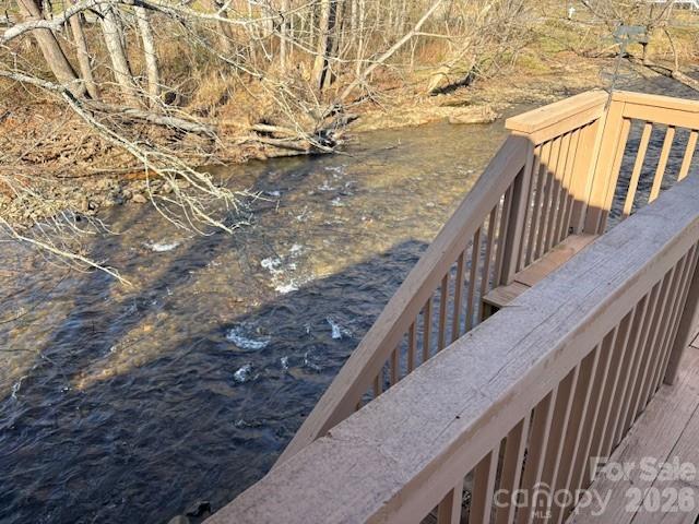 129 Mallard Loop Waynesville, NC 28785 - Photo 10 of 40 a view of balcony with wooden floor and fence