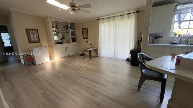 35250 Southwest 177th Court, Unit 136 Homestead, FL 33034 - Photo 7 of 18 a living room with furniture and a table