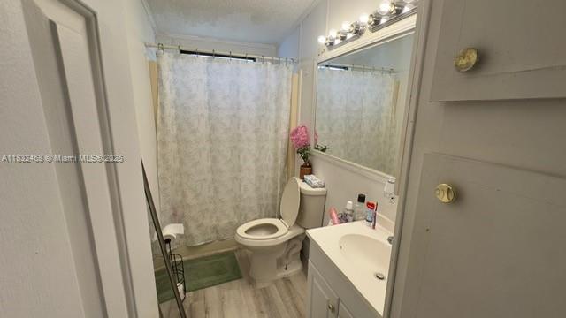 35250 Southwest 177th Court, Unit 136 Homestead, FL 33034 - Photo 10 of 18 a bathroom with a sink toilet and shower