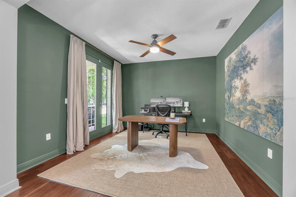 5310 Fishhawk Ridge Drive Lithia, FL 33547 - Photo 7 of 52 a work room with furniture and a large window