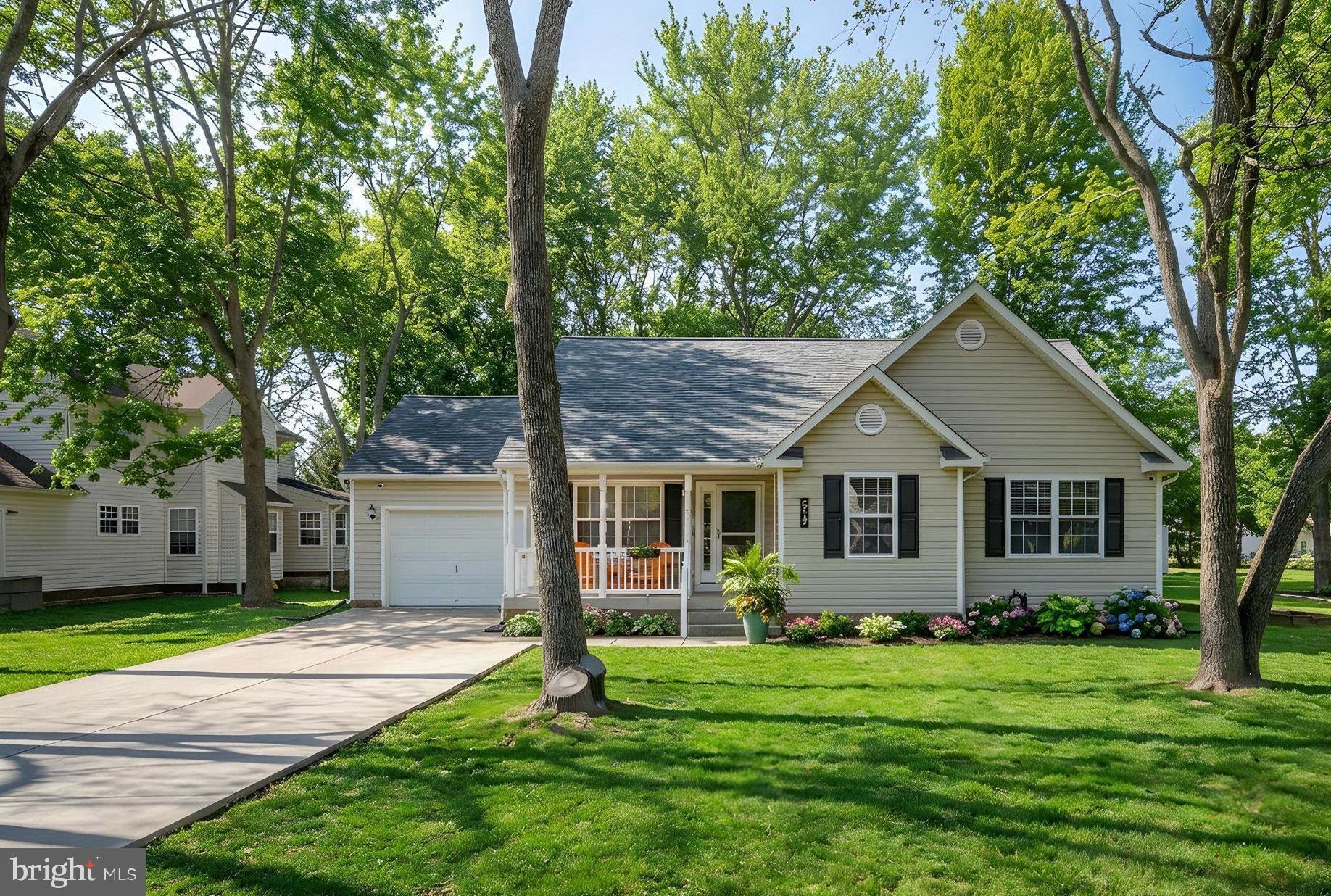 219 Santa Maria Avenue Colonial Beach, VA 22443 - Photo 1 of 52 a view of a house with a yard