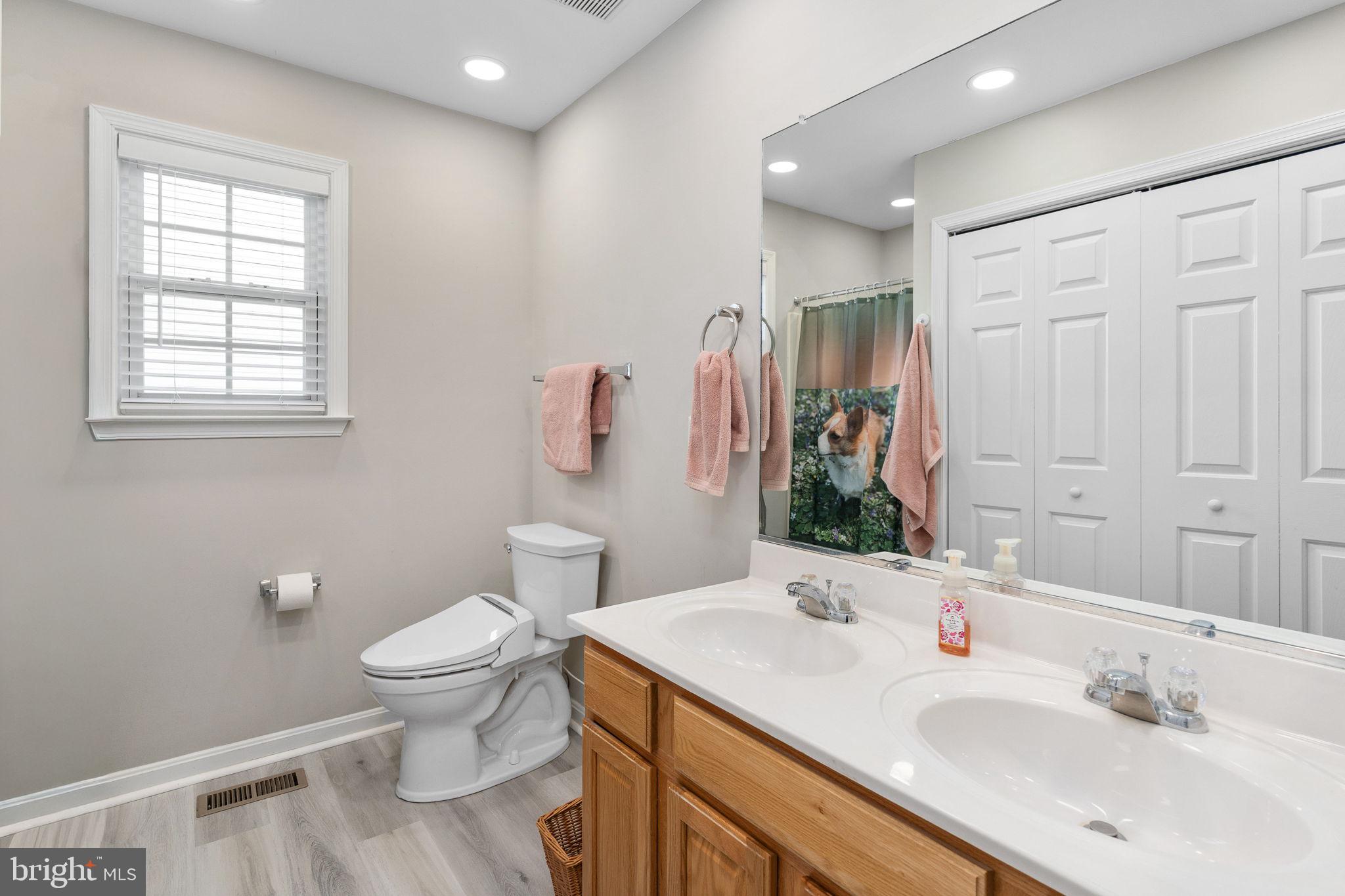 219 Santa Maria Avenue Colonial Beach, VA 22443 - Photo 20 of 52 a bathroom with a sink toilet and shower