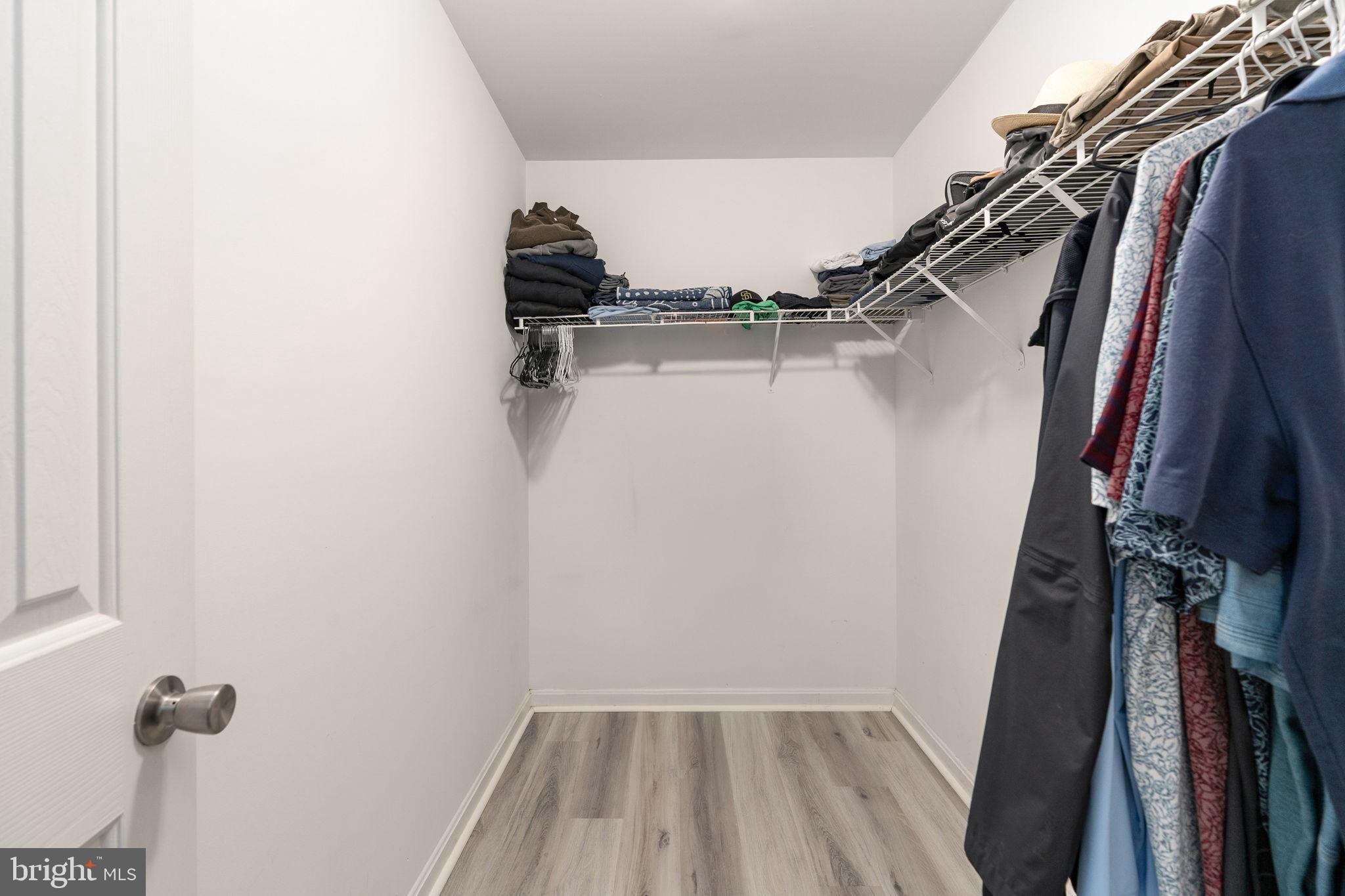 219 Santa Maria Avenue Colonial Beach, VA 22443 - Photo 21 of 52 a view of walk in closet with clothes and shoes