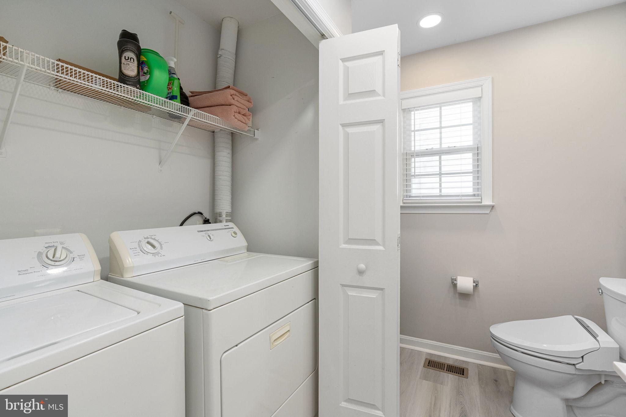 219 Santa Maria Avenue Colonial Beach, VA 22443 - Photo 22 of 52 a view of bathroom with a washer and dryer