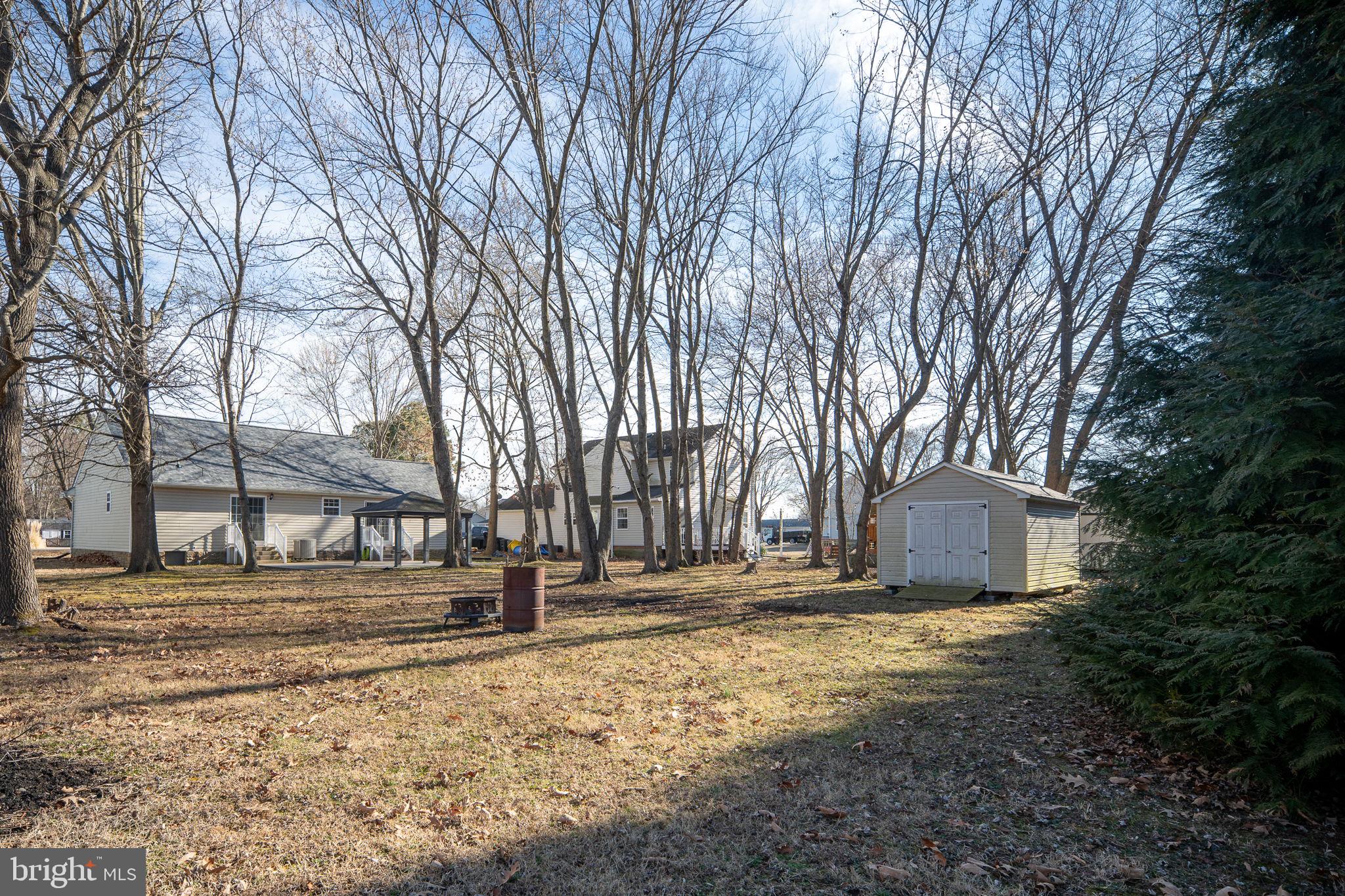 219 Santa Maria Avenue Colonial Beach, VA 22443 - Photo 36 of 52 a view of road with large trees