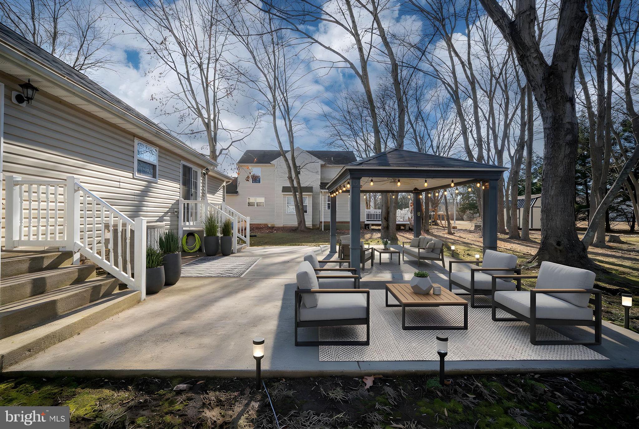 219 Santa Maria Avenue Colonial Beach, VA 22443 - Photo 39 of 52 a view of backyard with swimming pool and furniture