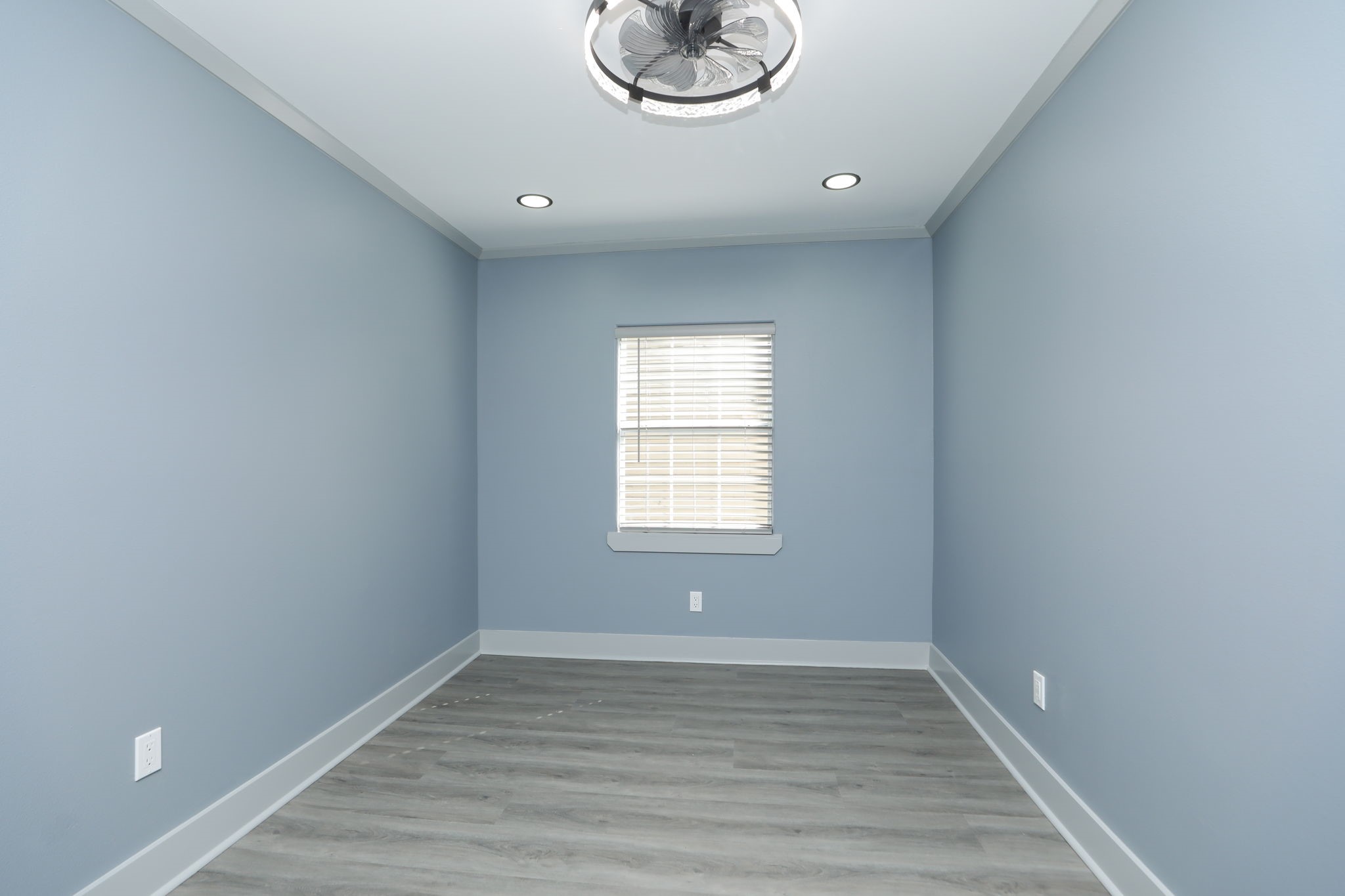 4047 Juliet Street Houston, TX 77087 - Photo 33 of 38 a view of an empty room with wooden floor and a window