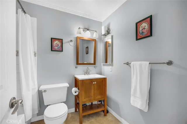 a close view of a utility room with dryer and washer