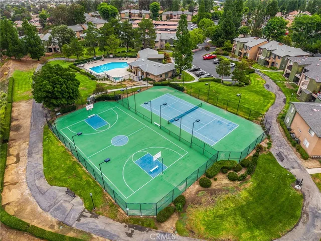 an aerial view of a house with a garden