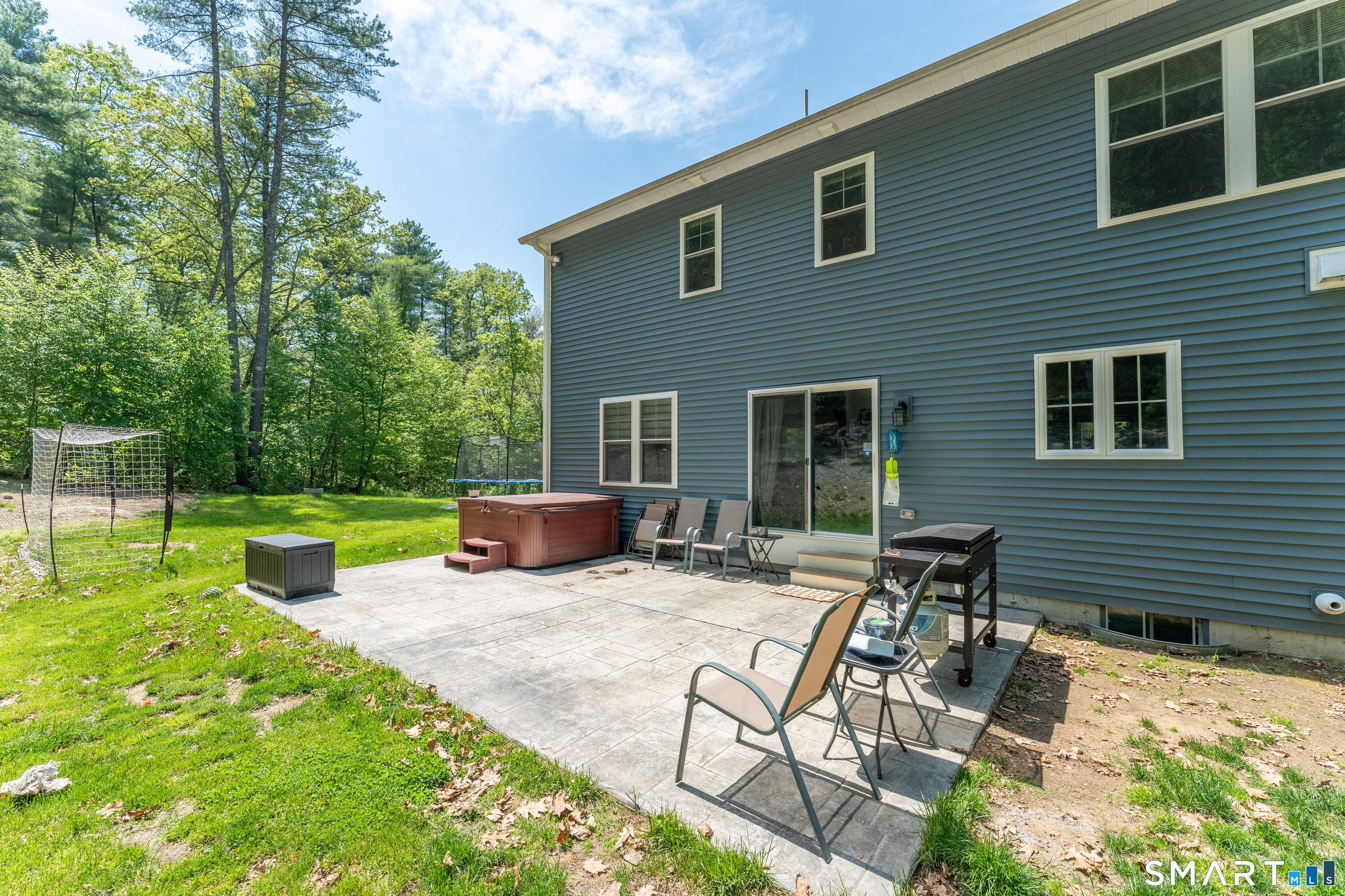 23 Senexet Rd No 1 Woodstock, CT 06281 - Photo 33 of 39 Private back patio complete with a hot tub