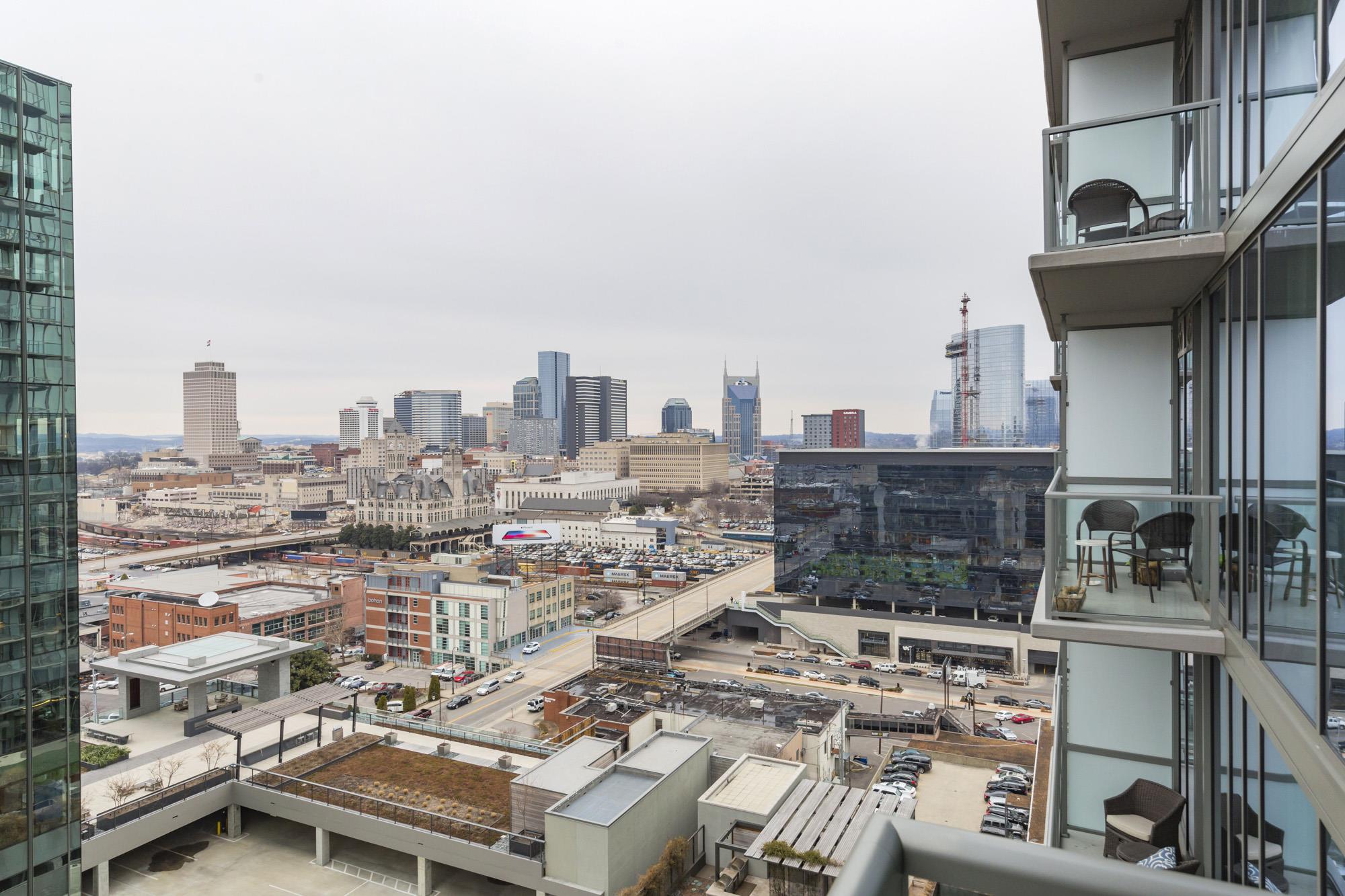1212 Laurel Street, Unit 1312 Nashville, TN 37203 - Photo 8 of 22 a city view with tall buildings