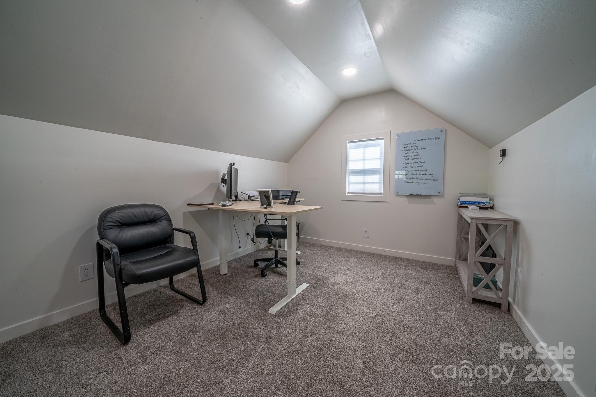 8271 Camelia Lane Denver, NC 28037 - Photo 22 of 27 a view of a workspace with furniture and a window
