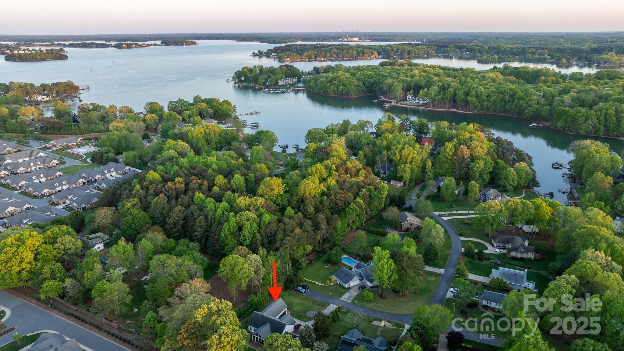 8271 Camelia Lane Denver, NC 28037 - Photo 25 of 27 a view of a lake with a mountain view
