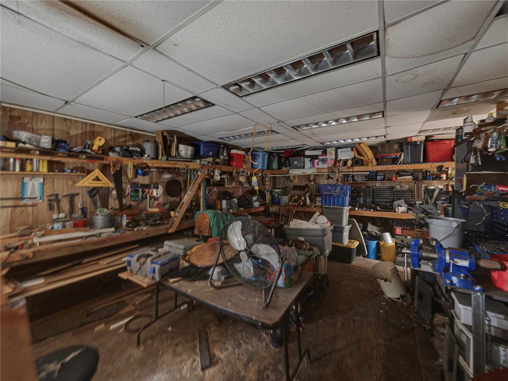 11404 Lithia Pinecrest Road Lithia, FL 33547 - Photo 57 of 63 a view of a storage room with racks