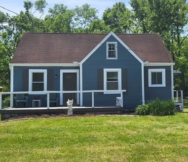 a house view with a garden space
