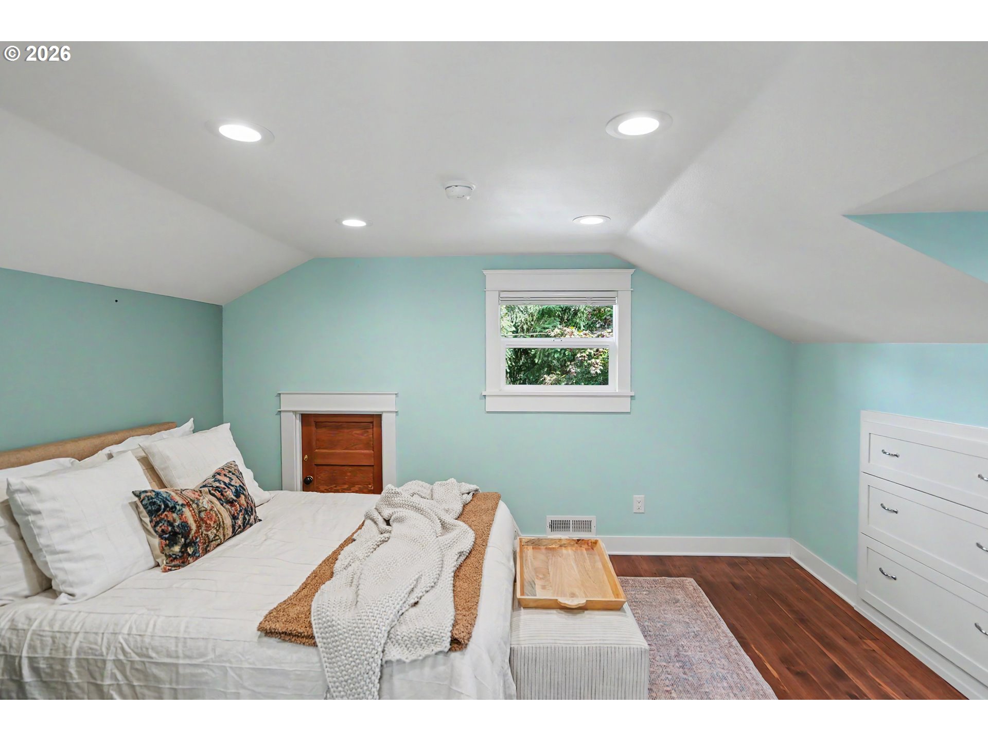 15055 Southeast Foster Road Dayton, OR 97114 - Photo 33 of 47 a bedroom with a bed and a painting on the wall