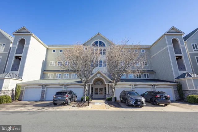 a view of a car park in front of house