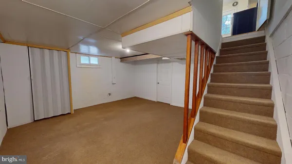 a view of an entryway with stairs